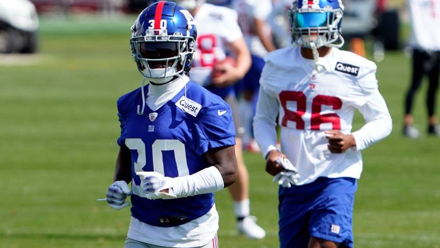 New York Giants cornerback Darnay Holmes (30) and wide receiver Darius Slayton (86) participate in organized team activities (OTA's) at the Giants training center on Wednesday, May 31, 2023, in East Rutherford.