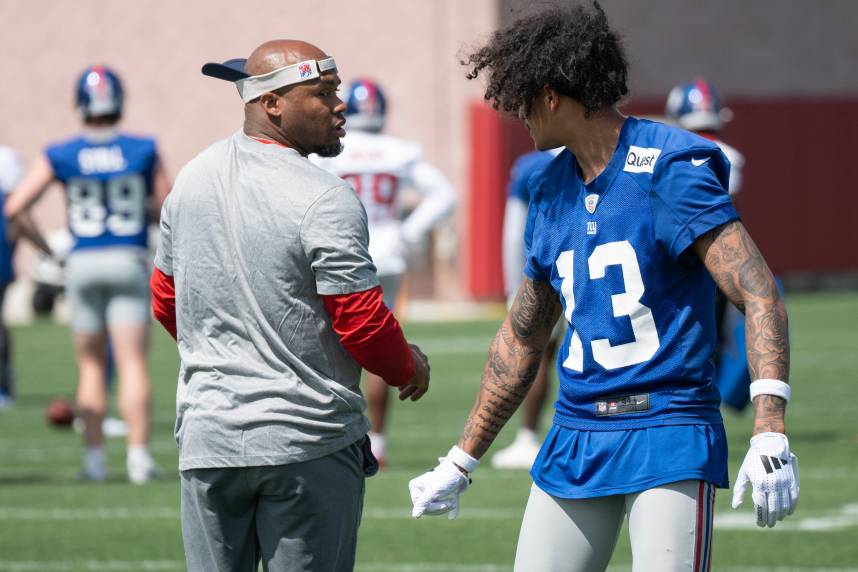 Right, Steve Smith, a former pro bowl NFL wide receiver, works with Jalin Hyatt, wide receiver. The NY Giants NFL team held an organized team activity at their training facility in East Rutherford, NJ on Thursday May 30, 2024.