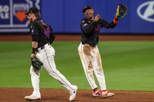 Jul 12, 2024; New York City, New York, USA;  New York Mets center fielder Harrison Bader (44) and shortstop Francisco Lindor (12) celebrate after defeating the Colorado Rockies 7-6 at Citi Field. Mandatory Credit: Wendell Cruz-USA TODAY Sports