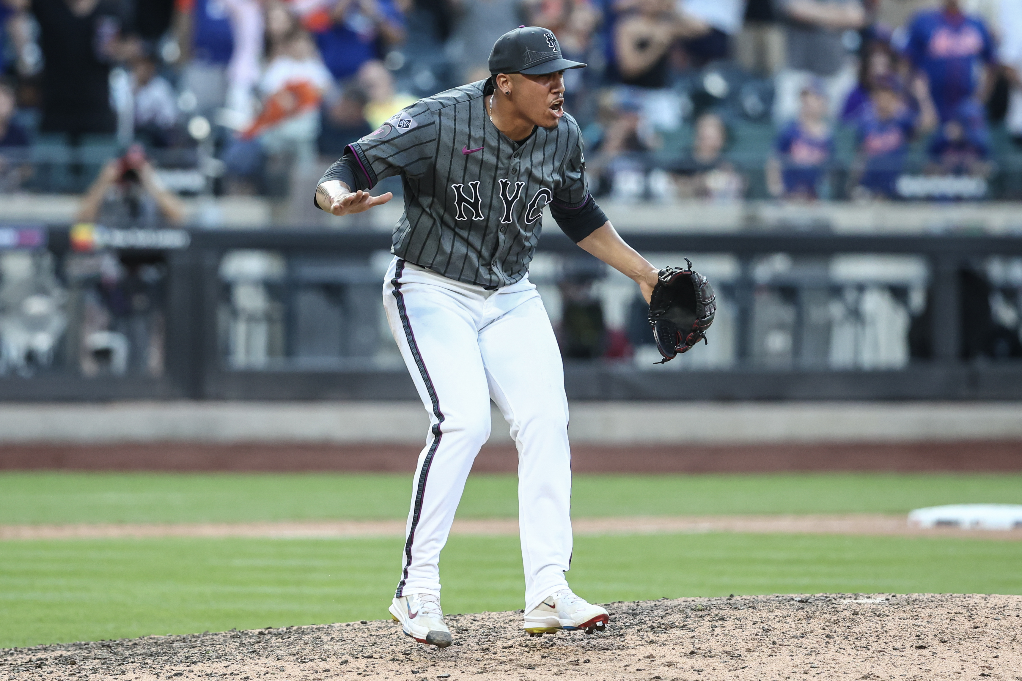 Jul 13, 2024; New York City, New York, USA; New York Mets relief pitcher Dedniel Núñez (72) reacts after recording a save after defeating the Colorado Rockies 7-3 at Citi Field. Mandatory Credit: Wendell Cruz-USA TODAY Sports