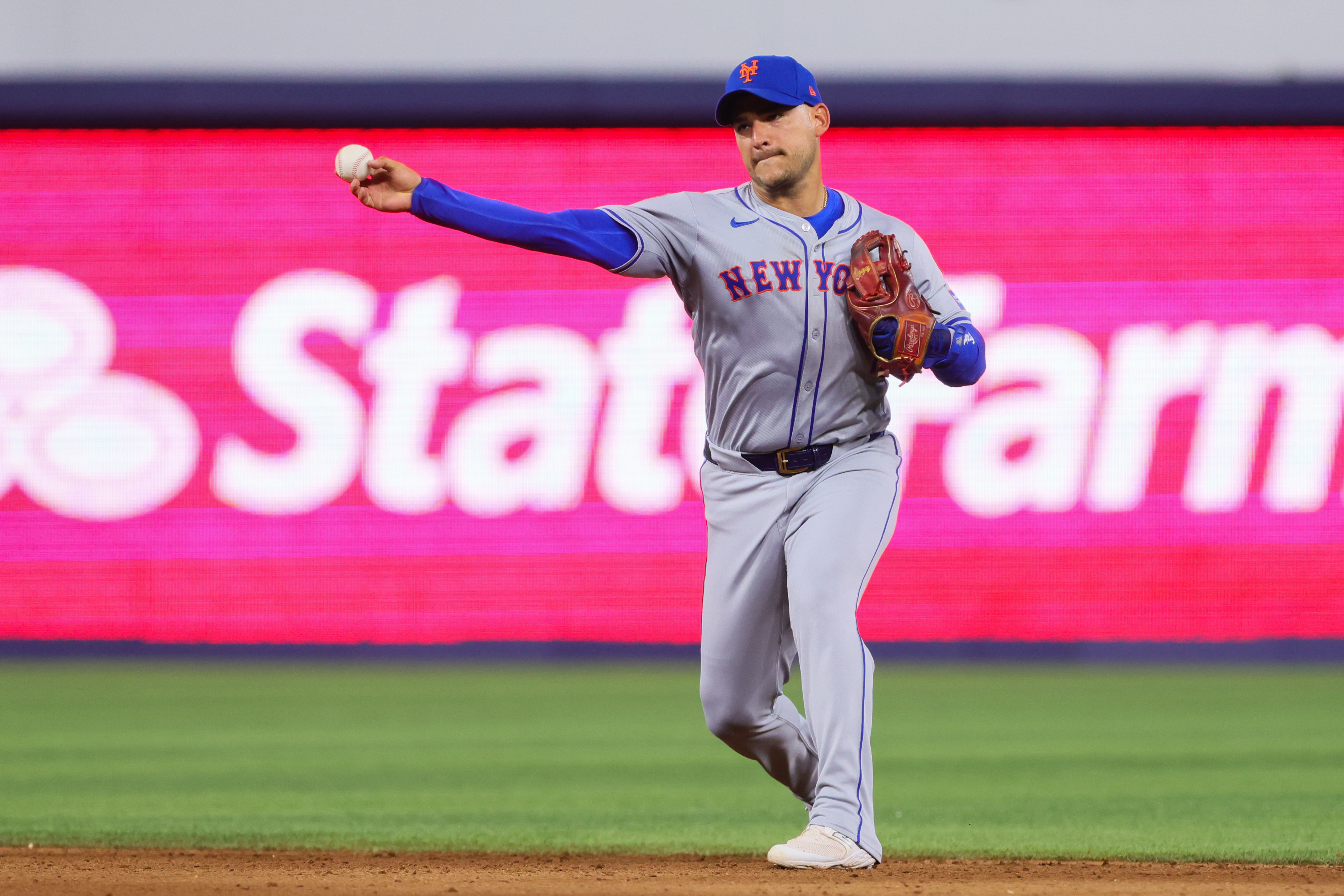 Jul 21, 2024; Miami, Florida, USA; New York Mets second baseman Jose Iglesias (Padres) (11) throws to first base to retire Miami Marlins second baseman Xavier Edwards (not pictured) during the sixth inning at loanDepot Park. Mandatory Credit: Sam Navarro-USA TODAY Sports