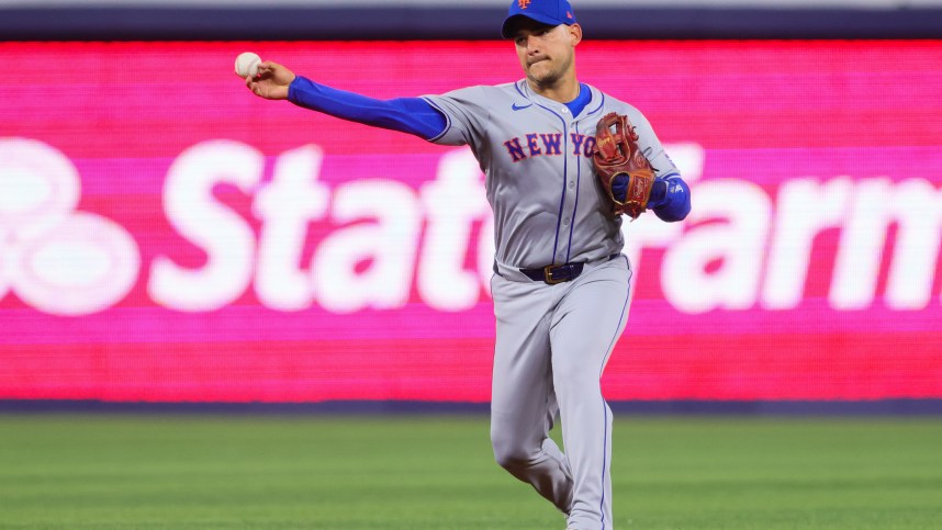 Jul 21, 2024; Miami, Florida, USA; New York Mets second baseman Jose Iglesias (Padres) (11) throws to first base to retire Miami Marlins second baseman Xavier Edwards (not pictured) during the sixth inning at loanDepot Park. Mandatory Credit: Sam Navarro-USA TODAY Sports