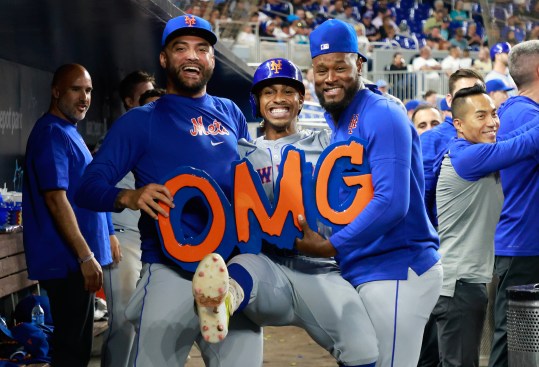 Jul 22, 2024; Miami, Florida, USA;  New York Mets starting pitcher Luis Severino (40) shortstop Francisco Lindor (12)  and New York Mets starting pitcher Sean Manaea (59) celebrate Lindor's home run against the Miami Marlins in the ninth inning at loanDepot Park. Mandatory Credit: Rhona Wise-USA TODAY Sports