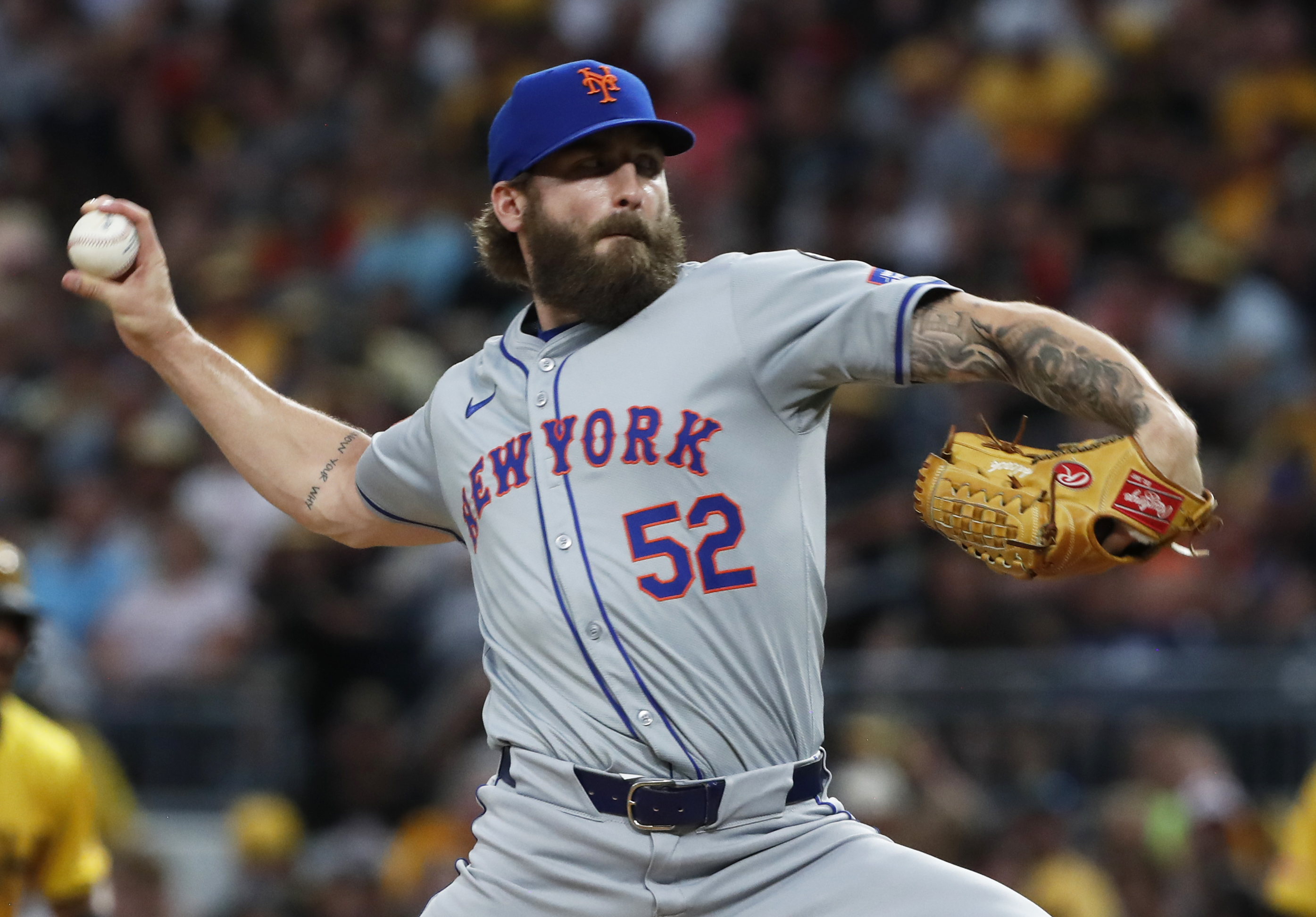 Jul 5, 2024; Pittsburgh, Pennsylvania, USA;  New York Mets pitcher Ty Adcock (52) pitches against the Pittsburgh Pirates during the seventh inning at PNC Park. Mandatory Credit: Charles LeClaire-USA TODAY Sports