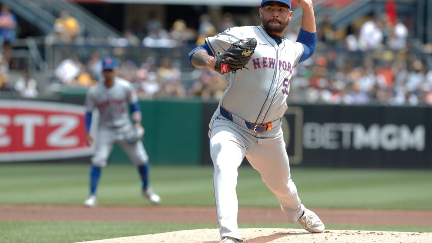 Jul 7, 2024; Pittsburgh, Pennsylvania, USA;  New York Mets starting pitcher Sean Manaea (59) delivers a pitch against the Pittsburgh Pirates during the first inning at PNC Park. Mandatory Credit: Charles LeClaire-USA TODAY Sports