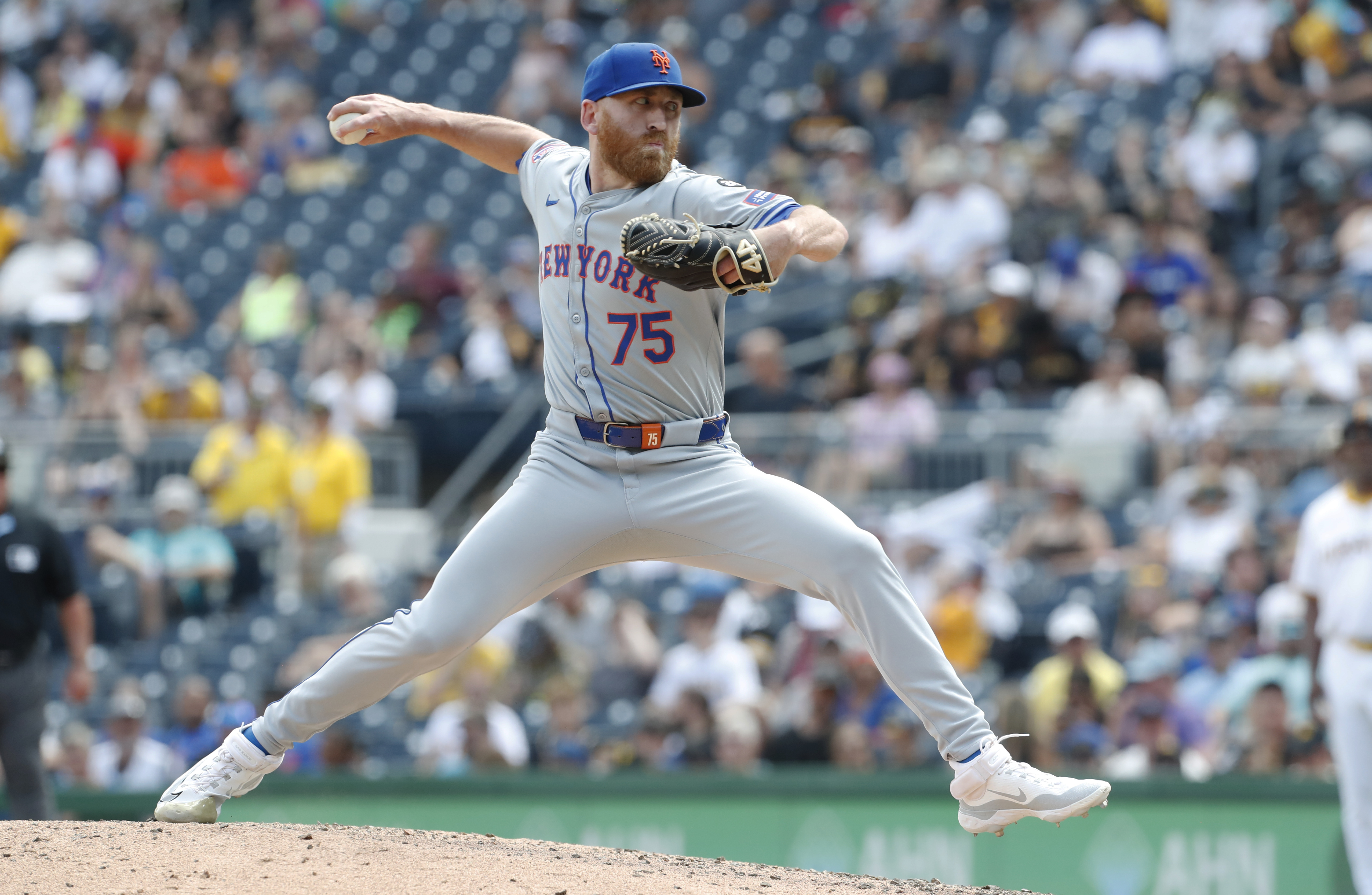 Jul 7, 2024; Pittsburgh, Pennsylvania, USA;  New York Mets pitcher Reed Garrett (75) pitches against the Pittsburgh Pirates during the seventh inning at PNC Park. The Mets won 3-2. Mandatory Credit: Charles LeClaire-USA TODAY Sports