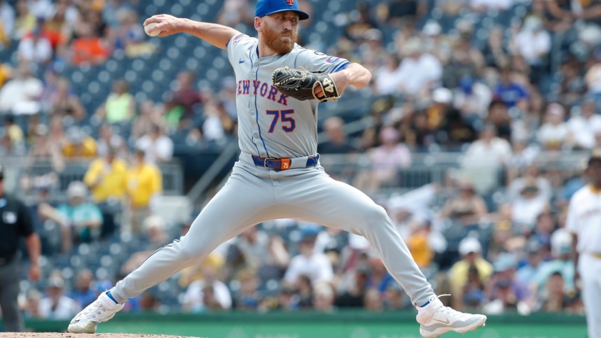 Jul 7, 2024; Pittsburgh, Pennsylvania, USA;  New York Mets pitcher Reed Garrett (75) pitches against the Pittsburgh Pirates during the seventh inning at PNC Park. The Mets won 3-2. Mandatory Credit: Charles LeClaire-USA TODAY Sports