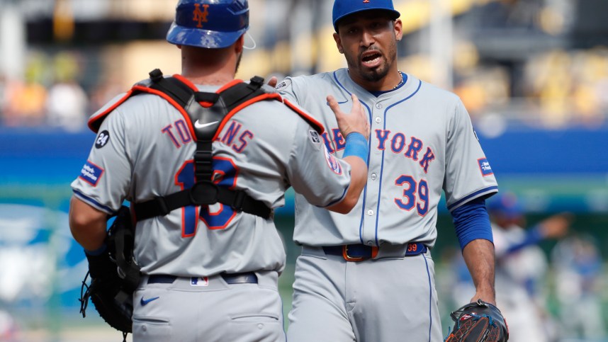 Jul 7, 2024; Pittsburgh, Pennsylvania, USA;  New York Mets catcher Luis Torrens (13) and relief pitcher Edwin Diaz (39) celebrate after defeating the Pittsburgh Pirates during the ninth inning at PNC Park. The Mets won 3-2. Mandatory Credit: Charles LeClaire-USA TODAY Sports