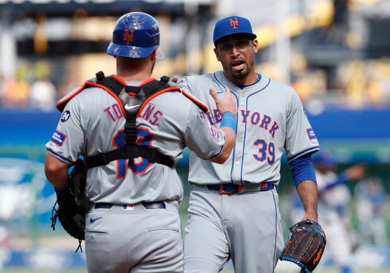 Jul 7, 2024; Pittsburgh, Pennsylvania, USA;  New York Mets catcher Luis Torrens (13) and relief pitcher Edwin Diaz (39) celebrate after defeating the Pittsburgh Pirates during the ninth inning at PNC Park. The Mets won 3-2. Mandatory Credit: Charles LeClaire-USA TODAY Sports