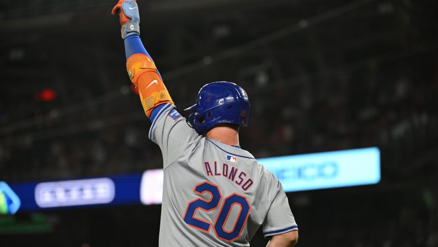 July 1, 2024; Washington, District of Columbia, USA; New York Mets first baseman Pete Alonso (20) reacts after a three-run home run by designated hitter JD Martinez (28) (not pictured) against the Washington Nationals during the tenth inning at Nationals Park. Mandatory Photo Credit: Rafael Suanes-USA TODAY Sports