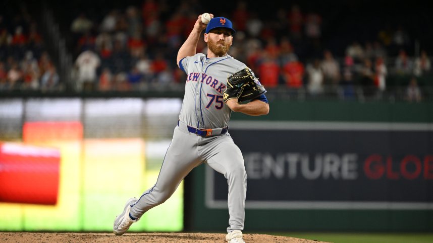 Jul 1, 2024; Washington, District of Columbia, USA; New York Mets relief pitcher Reed Garrett (75) prepares the throw a pitch against the Washington Nationals during the tenth inning at Nationals Park. Mandatory Credit: Rafael Suanes-USA TODAY Sports