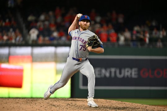 Jul 1, 2024; Washington, District of Columbia, USA; New York Mets relief pitcher Reed Garrett (75) prepares the throw a pitch against the Washington Nationals during the tenth inning at Nationals Park. Mandatory Credit: Rafael Suanes-USA TODAY Sports