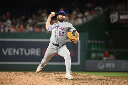 Jul 3, 2024; Washington, District of Columbia, USA; New York Mets relief pitcher Ty Adcock (52) throws a pitch against the Washington Nationals during the eighth inning at Nationals Park. Mandatory Credit: Rafael Suanes-USA TODAY Sports