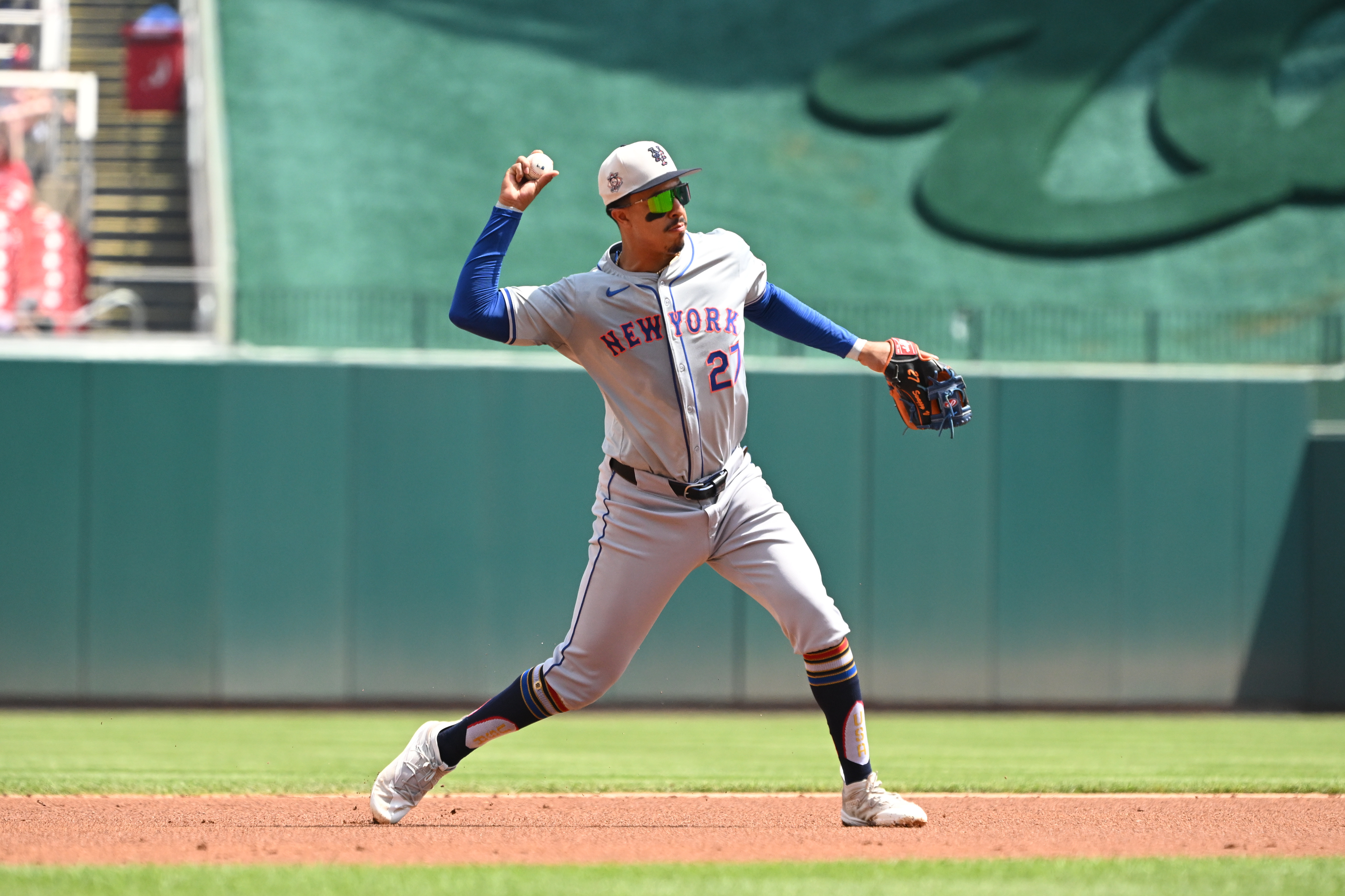 Jul 4, 2024; Washington, District of Columbia, USA; New York Mets third baseman Mark Vientos (27) throws to first base against the Washington Nationals during the first inning at Nationals Park. Mandatory Credit: Rafael Suanes-USA TODAY Sports