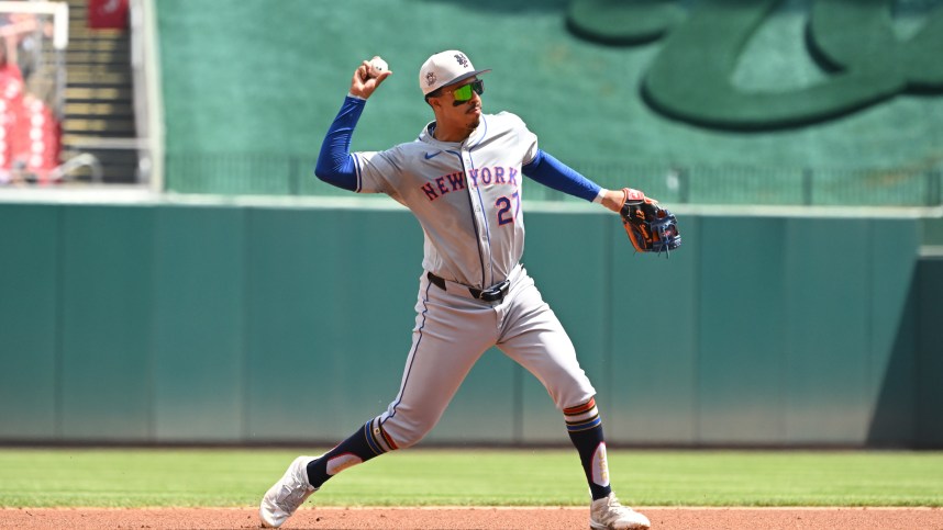 Jul 4, 2024; Washington, District of Columbia, USA; New York Mets third baseman Mark Vientos (27) throws to first base against the Washington Nationals during the first inning at Nationals Park. Mandatory Credit: Rafael Suanes-USA TODAY Sports