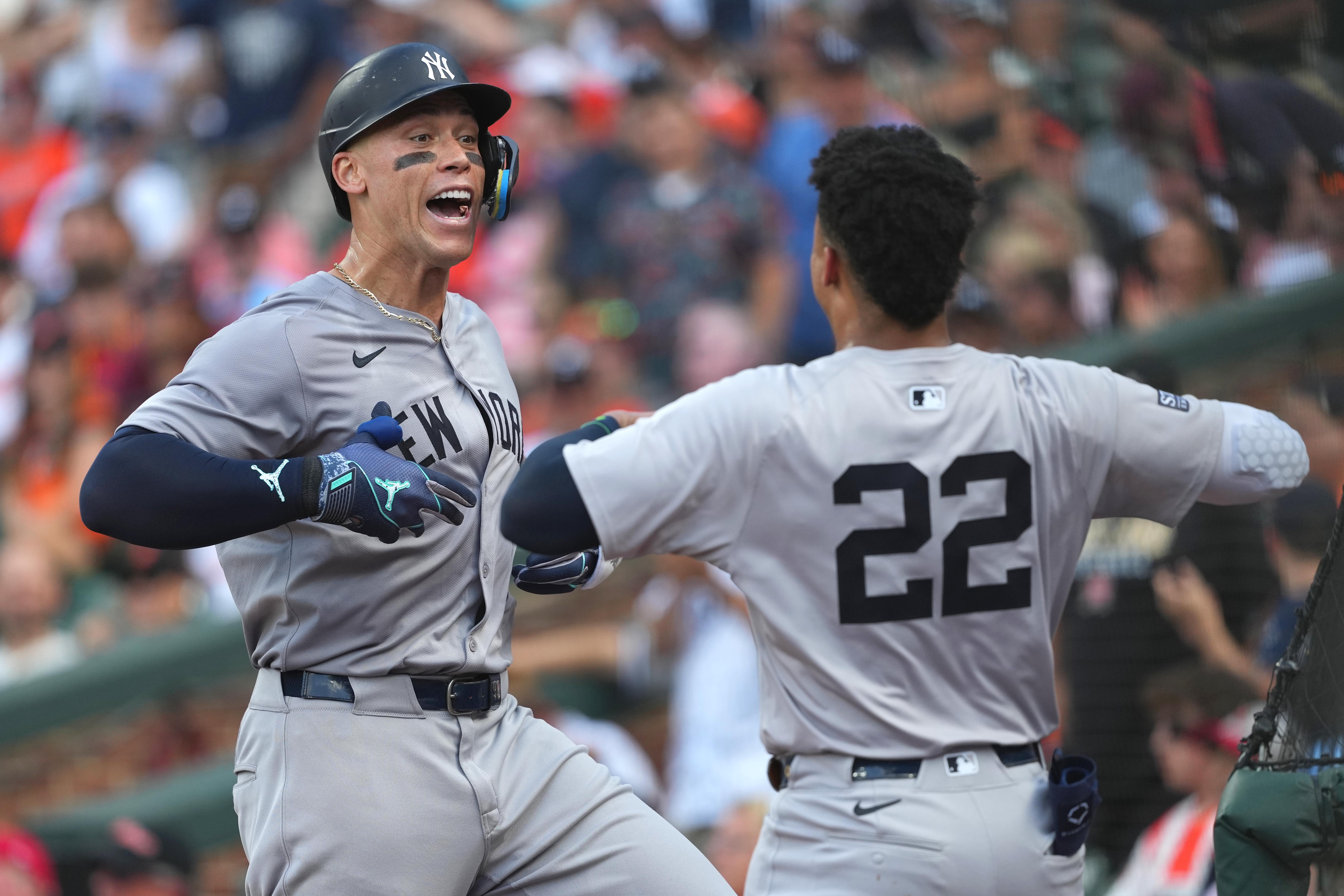 Jul 13, 2024; Baltimore, Maryland, USA; New York Yankees outfielder Aaron Judge (99) greeted by outfielder Juan Soto (22) following his solo home run in the fifth inning against the Baltimore Orioles at Oriole Park at Camden Yards. Mandatory Credit: Mitch Stringer-USA TODAY Sports