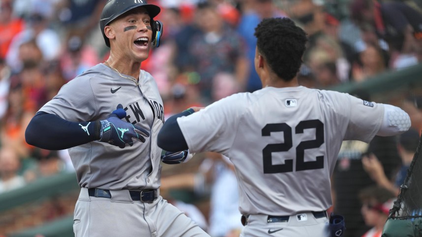 Jul 13, 2024; Baltimore, Maryland, USA; New York Yankees outfielder Aaron Judge (99) greeted by outfielder Juan Soto (22) following his solo home run in the fifth inning against the Baltimore Orioles at Oriole Park at Camden Yards. Mandatory Credit: Mitch Stringer-USA TODAY Sports