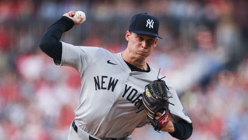 Jul 30, 2024; Philadelphia, Pennsylvania, USA; New York Yankees starting pitcher Will Warren (98) throws a pitch during the second inning against the Philadelphia Phillies at Citizens Bank Park. Mandatory Credit: Bill Streicher-USA TODAY Sports