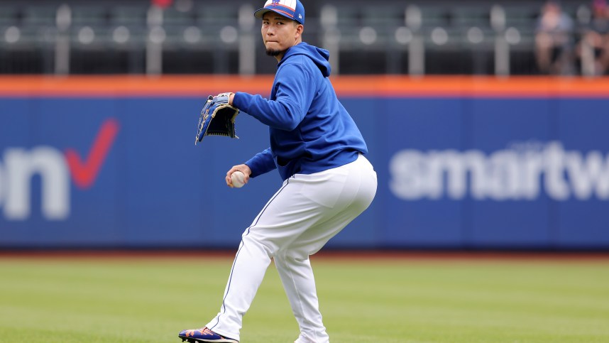 May 14, 2024; New York City, New York, USA; New York Mets injured pitcher Kodai Senga (34) throws in the outfield before a game against the Philadelphia Phillies at Citi Field. Mandatory Credit: Brad Penner-USA TODAY Sports