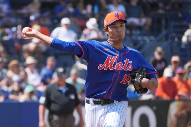 Mar 10, 2024; Port St. Lucie, Florida, USA;  New York Mets pitcher Shintaro Fujinami (19) throws over to first base in the seventh inning against the Detroit Tigers at Clover Park. Mandatory Credit: Jim Rassol-USA TODAY Sports