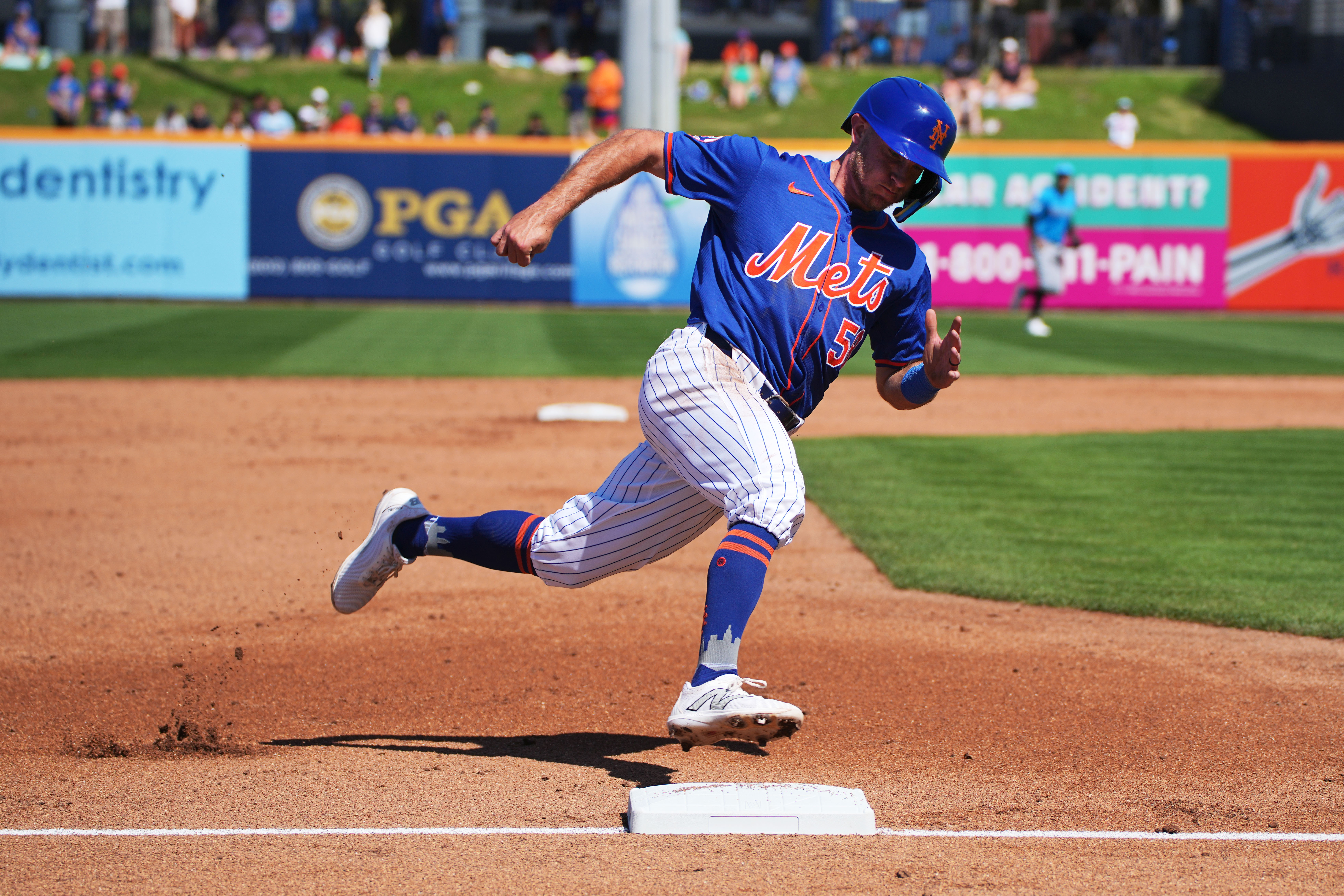 Feb 27, 2024; Port St. Lucie, Florida, USA;  New York Mets second baseman Rylan Bannon (58) rounds third base and scores a run in the third inning against the Miami Marlins at Clover Park. Mandatory Credit: Jim Rassol-USA TODAY Sports