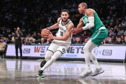 Feb 13, 2024; Brooklyn, New York, USA;  Brooklyn Nets guard Ben Simmons (10) drives past Boston Celtics center Al Horford (42) in the third quarter at Barclays Center. Mandatory Credit: Wendell Cruz-USA TODAY Sports