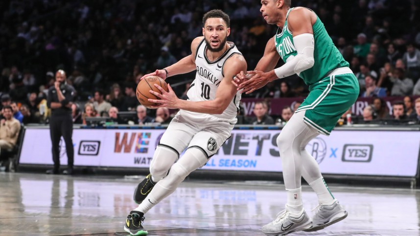 Feb 13, 2024; Brooklyn, New York, USA;  Brooklyn Nets guard Ben Simmons (10) drives past Boston Celtics center Al Horford (42) in the third quarter at Barclays Center. Mandatory Credit: Wendell Cruz-USA TODAY Sports