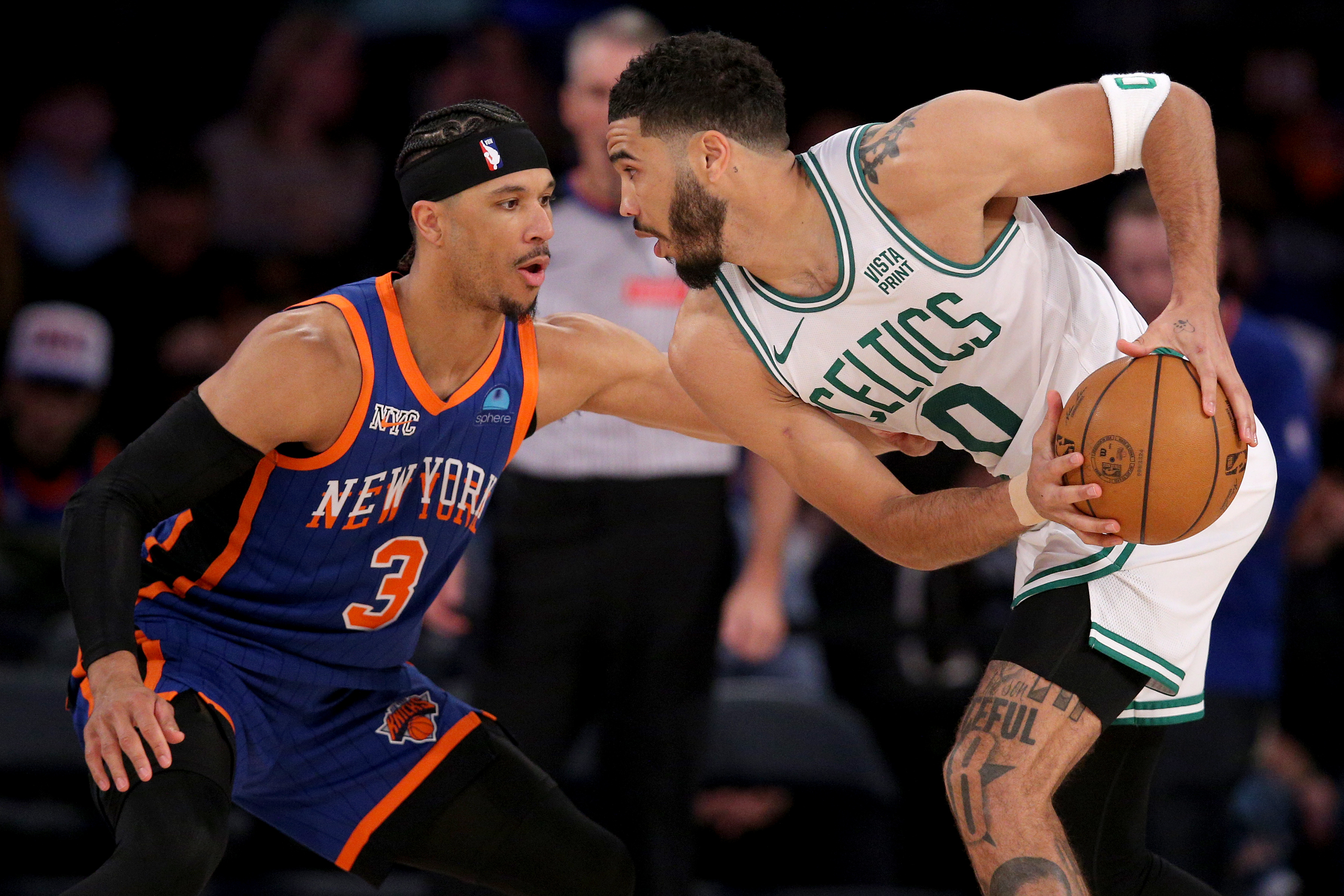 Feb 24, 2024; New York, New York, USA; Boston Celtics forward Jayson Tatum (0) controls the ball against New York Knicks guard Josh Hart (3) during the third quarter at Madison Square Garden. Mandatory Credit: Brad Penner-USA TODAY Sports