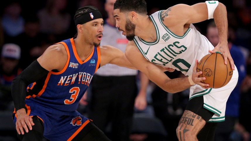 Feb 24, 2024; New York, New York, USA; Boston Celtics forward Jayson Tatum (0) controls the ball against New York Knicks guard Josh Hart (3) during the third quarter at Madison Square Garden. Mandatory Credit: Brad Penner-USA TODAY Sports