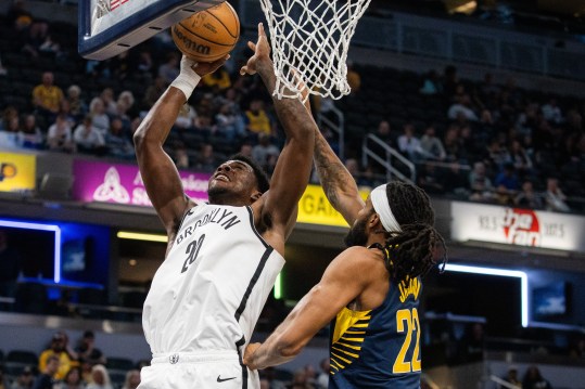 Apr 1, 2024; Indianapolis, Indiana, USA; Brooklyn Nets center Day'Ron Sharpe (20) shoots the ball while Indiana Pacers forward Isaiah Jackson (22) defends in the second half at Gainbridge Fieldhouse. Mandatory Credit: Trevor Ruszkowski-USA TODAY Sports