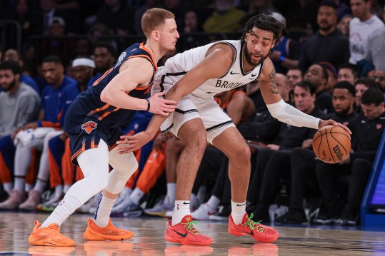 Apr 12, 2024; New York, New York, USA; Brooklyn Nets forward Trendon Watford (9) dribbles against New York Knicks guard Donte DiVincenzo (0) during the second half at Madison Square Garden. Mandatory Credit: Vincent Carchietta-USA TODAY Sports