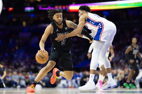 Apr 14, 2024; Philadelphia, Pennsylvania, USA; Brooklyn Nets forward Trendon Watford (9) dribbles the ball agains Philadelphia 76ers forward Tobias Harris (12) during the second quarter at Wells Fargo Center. Mandatory Credit: Bill Streicher-USA TODAY Sports