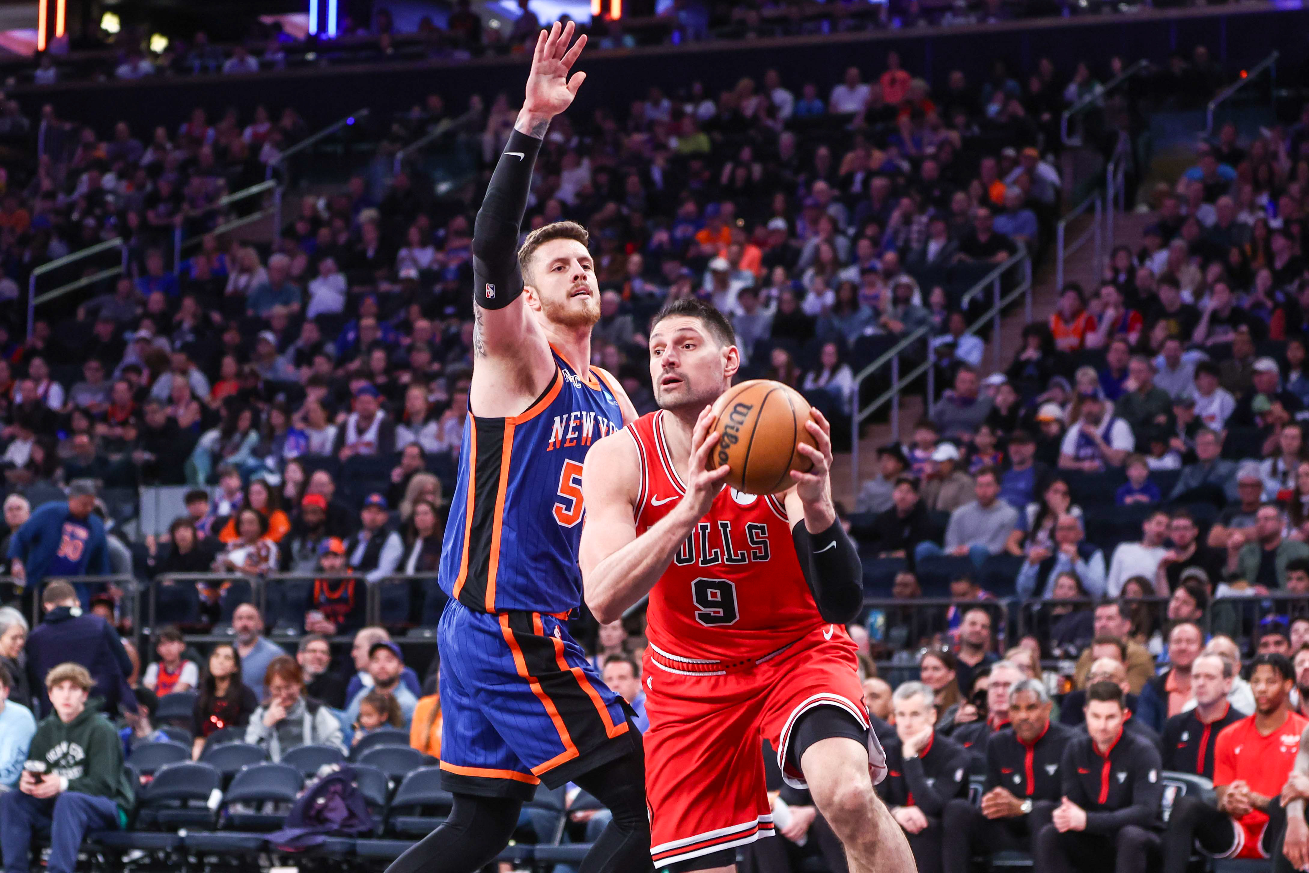 Apr 14, 2024; New York, New York, USA;  Chicago Bulls center Nikola Vucevic (9) and New York Knicks center Isaiah Hartenstein (55) at Madison Square Garden. Mandatory Credit: Wendell Cruz-USA TODAY Sports