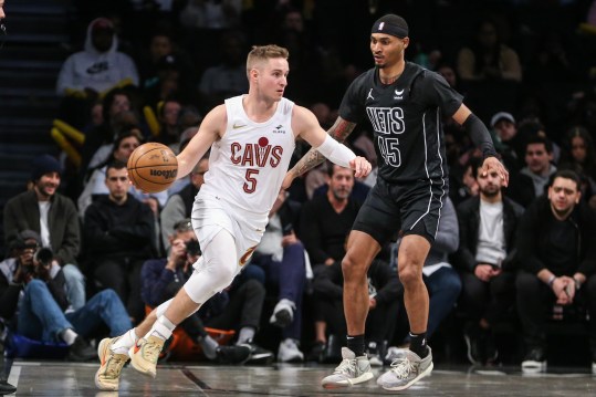 Feb 8, 2024; Brooklyn, New York, USA; Cleveland Cavaliers guard Sam Merrill (5) looks to drive past Brooklyn Nets guard Keon Johnson (45) in the fourth quarter at Barclays Center. Mandatory Credit: Wendell Cruz-USA TODAY Sports