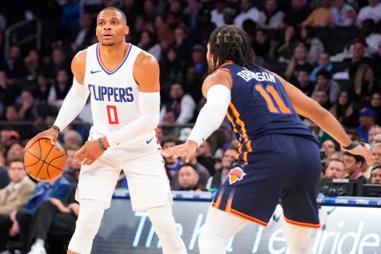 Nov 6, 2023; New York, New York, USA; Los Angeles Clipper point guard Russell Westbrook (0) dribbles the ball against New York Knicks point guard Jalen Brunson (11) during the fourth quarter at Madison Square Garden. Mandatory Credit: Gregory Fisher-USA TODAY Sports