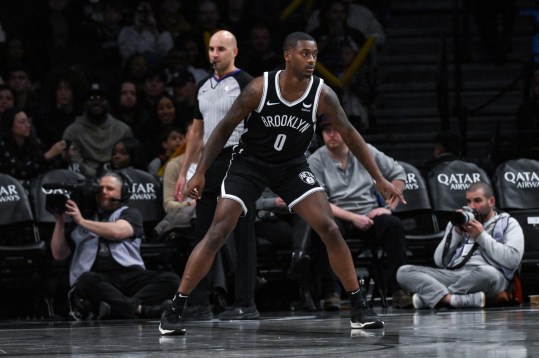 Nov 25, 2023; Brooklyn, New York, USA; Brooklyn Nets forward Dariq Whitehead (0) during his NBA debut in the fourth quarter against the Miami Heat at Barclays Center. Mandatory Credit: John Jones-USA TODAY Sports