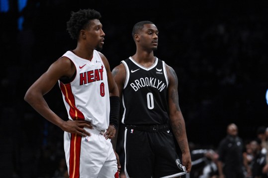 Nov 25, 2023; Brooklyn, New York, USA; Brooklyn Nets forward Dariq Whitehead (right) makes his NBA debut during the fourth quarter against the Miami Heat at Barclays Center. Mandatory Credit: John Jones-USA TODAY Sports