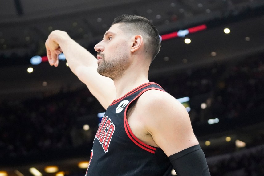 Apr 5, 2024; Chicago, Illinois, USA; Chicago Bulls center Nikola Vucevic (9) watches his three point basket go in against the New York Knicks during the first quarter at United Center. Mandatory Credit: David Banks-USA TODAY Sports