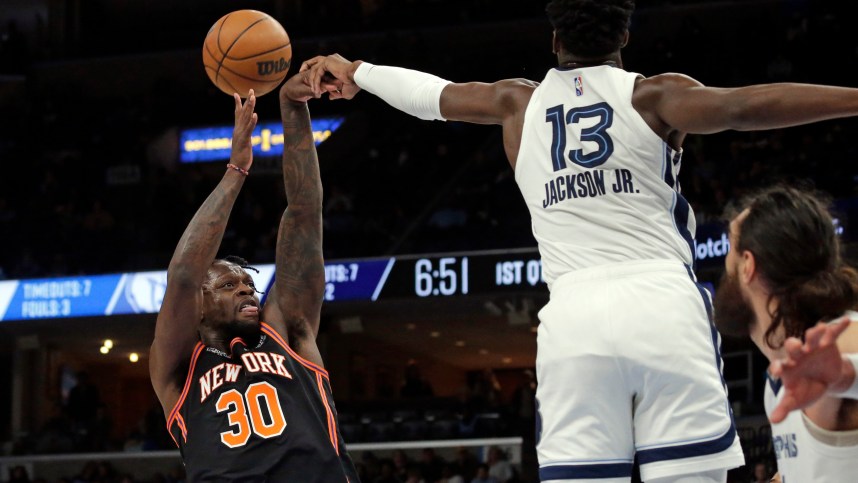 Mar 11, 2022; Memphis, Tennessee, USA; New York Knicks forward Julius Randle (30) shoots as Memphis Grizzlies forward Jaren Jackson Jr. (13) blocks his shot during the first half at FedExForum. Mandatory Credit: Petre Thomas-USA TODAY Sports