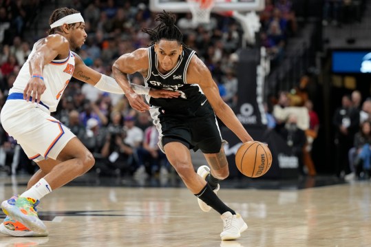 Mar 29, 2024; San Antonio, Texas, USA; San Antonio Spurs guard Devin Vassell (24) drives to the basket while defended by New York Knicks guard Miles McBride (2) during the first half at Frost Bank Center. Mandatory Credit: Scott Wachter-USA TODAY Sports