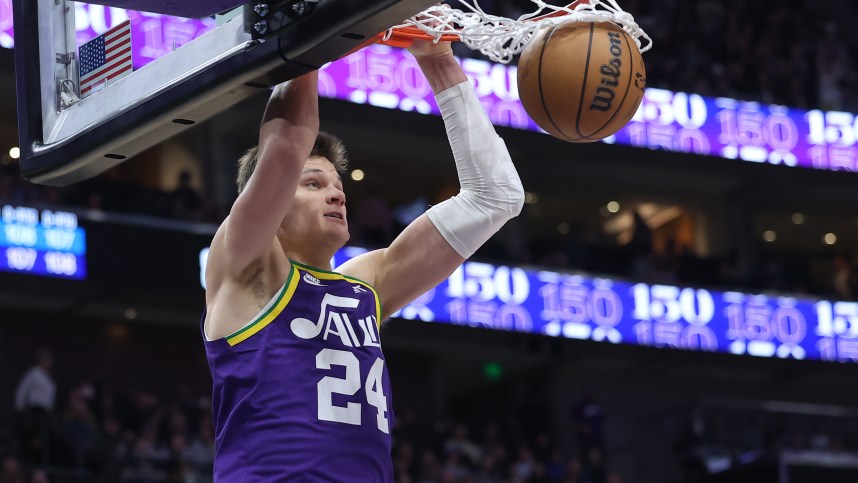 Dec 13, 2023; Salt Lake City, Utah, USA; Utah Jazz center Walker Kessler (24) dunks the ball against the New York Knicks during the third quarter at Delta Center. Mandatory Credit: Rob Gray-USA TODAY Sports