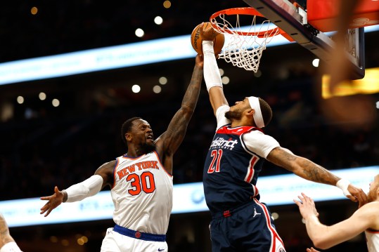 Jan 6, 2024; Washington, District of Columbia, USA; Washington Wizards center Daniel Gafford (21) blocks the shot of New York Knicks forward Julius Randle (30) in the second quarter at Capital One Arena. Mandatory Credit: Geoff Burke-USA TODAY Sports