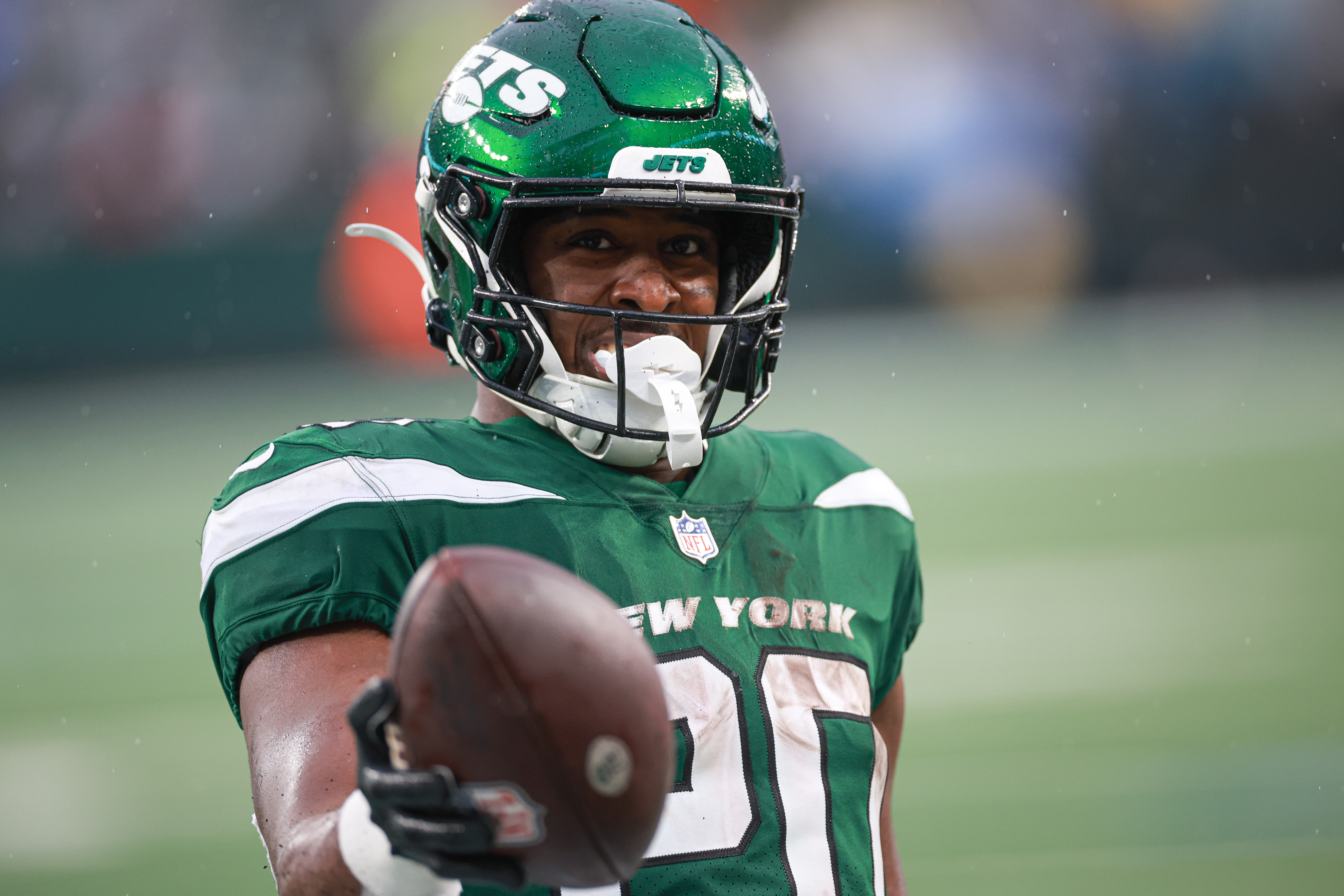 Dec 10, 2023; East Rutherford, New Jersey, USA; New York Jets running back Breece Hall (20) celebrates after a touchdown reception during the second half against the Houston Texans at MetLife Stadium. Mandatory Credit: Vincent Carchietta-USA TODAY Sports