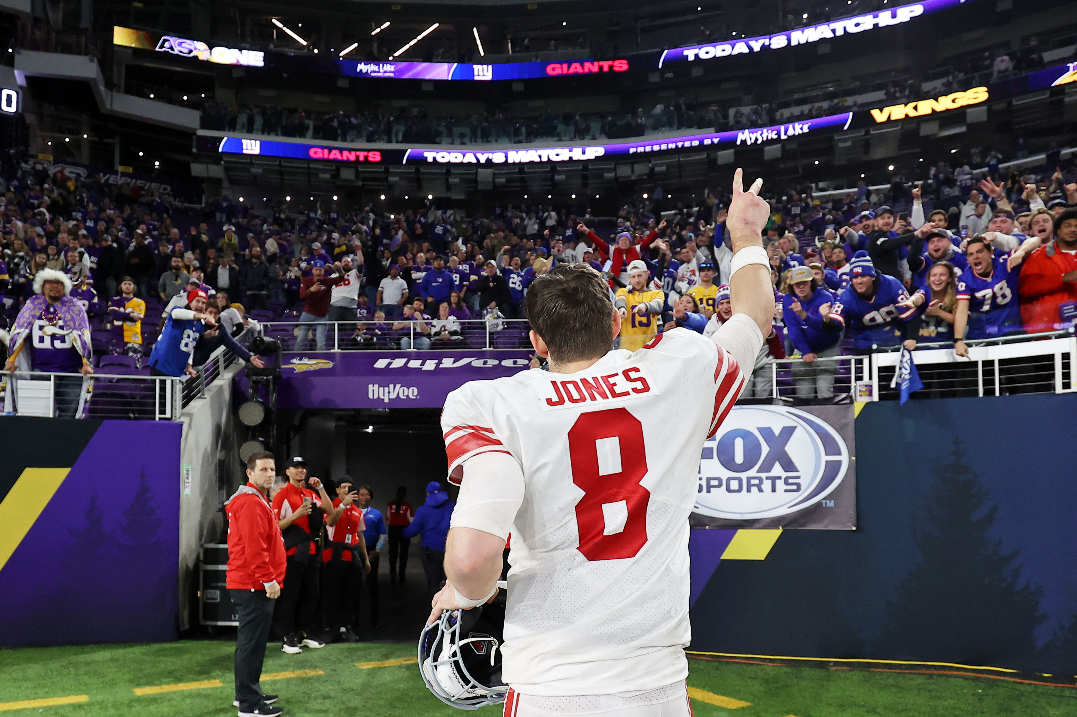 Jan 15, 2023; Minneapolis, Minnesota, USA; New York Giants quarterback Daniel Jones (8) reacts after winning a wild card game against the Minnesota Vikings at U.S. Bank Stadium. Mandatory Credit: Matt Krohn-USA TODAY Sports