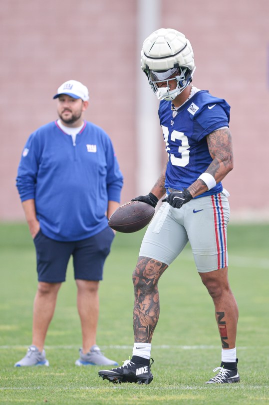 Jul 24, 2024; East Rutherford, NJ, USA; New York Giants tight end Lawrence Cager (83) reacts after a play during training camp at Quest Diagnostics Training Facility. Mandatory Credit: Vincent Carchietta-USA TODAY Sports