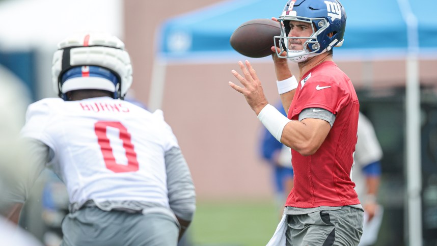 Jul 24, 2024; East Rutherford, NJ, USA; New York Giants quarterback Daniel Jones (8) passes the ball during training camp at Quest Diagnostics Training Facility. Mandatory Credit: Vincent Carchietta-USA TODAY Sports