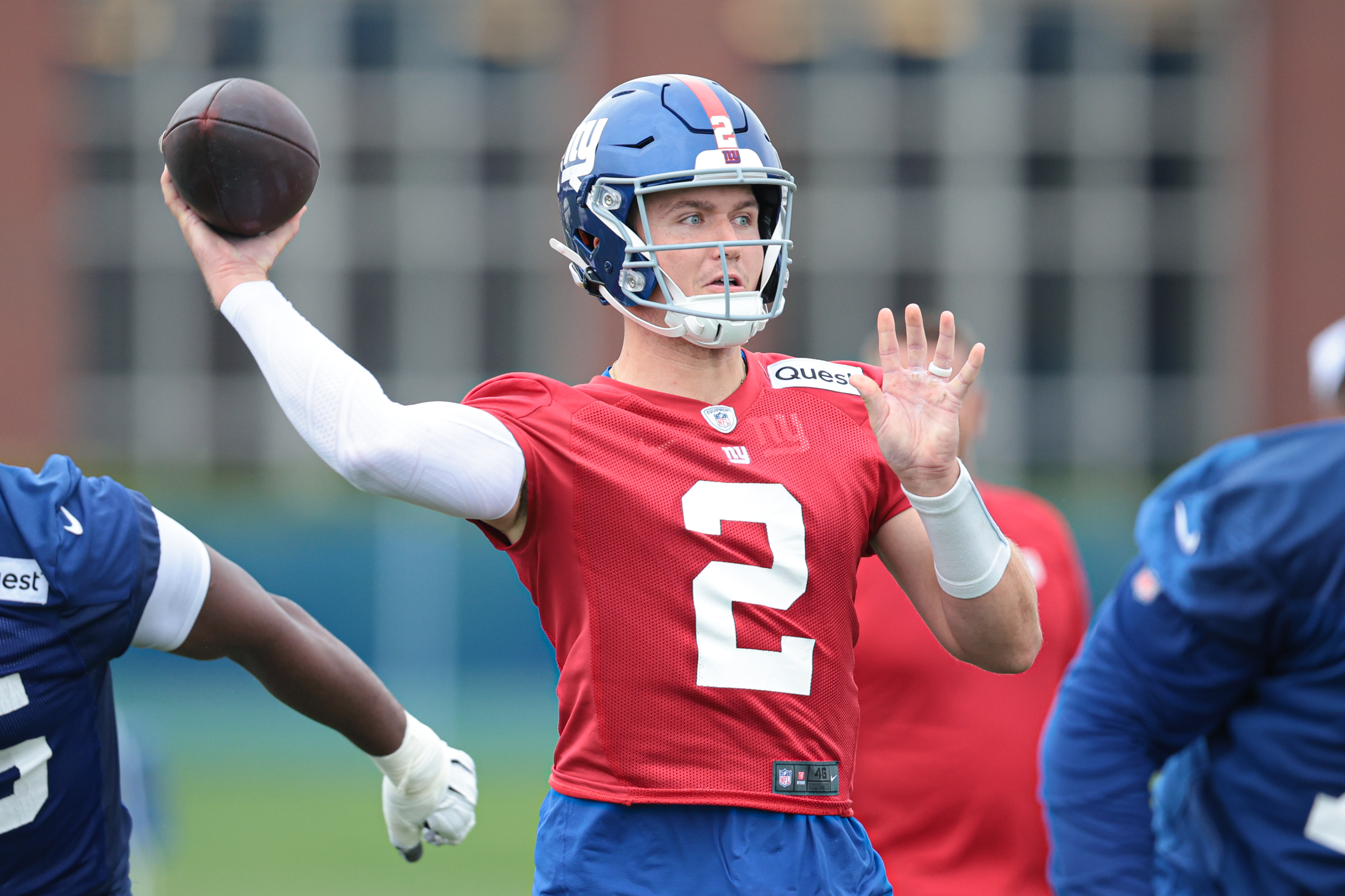 Jul 24, 2024; East Rutherford, NJ, USA; New York Giants quarterback Drew Lock (2) drops back to pass during training camp at Quest Diagnostics Training Facility. Mandatory Credit: Vincent Carchietta-USA TODAY Sports