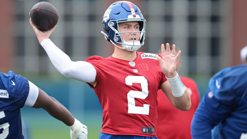 Jul 24, 2024; East Rutherford, NJ, USA; New York Giants quarterback Drew Lock (2) drops back to pass during training camp at Quest Diagnostics Training Facility. Mandatory Credit: Vincent Carchietta-USA TODAY Sports