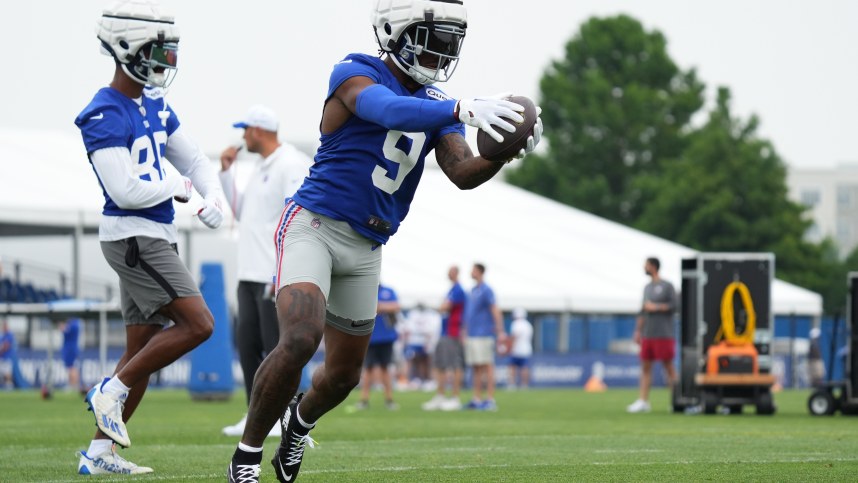 Jul 25, 2024; East Rutherford, NY, USA; New York Giants wide receiver Malik Nabers (9) catches a pass during training camp at Quest Diagnostics Training Center. Mandatory Credit: Lucas Boland-USA TODAY Sports