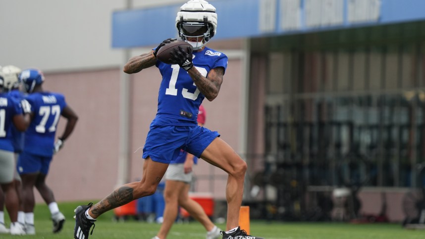 Jul 25, 2024; East Rutherford, NY, USA; New York Giants wide receiver Jalin Hyatt (13) catches a pass during training camp at Quest Diagnostics Training Center. Mandatory Credit: Lucas Boland-USA TODAY Sports